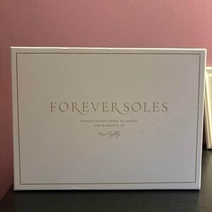 Velvet emerald green strappy heels.